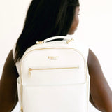 White backpack 154511C6 worn by woman
