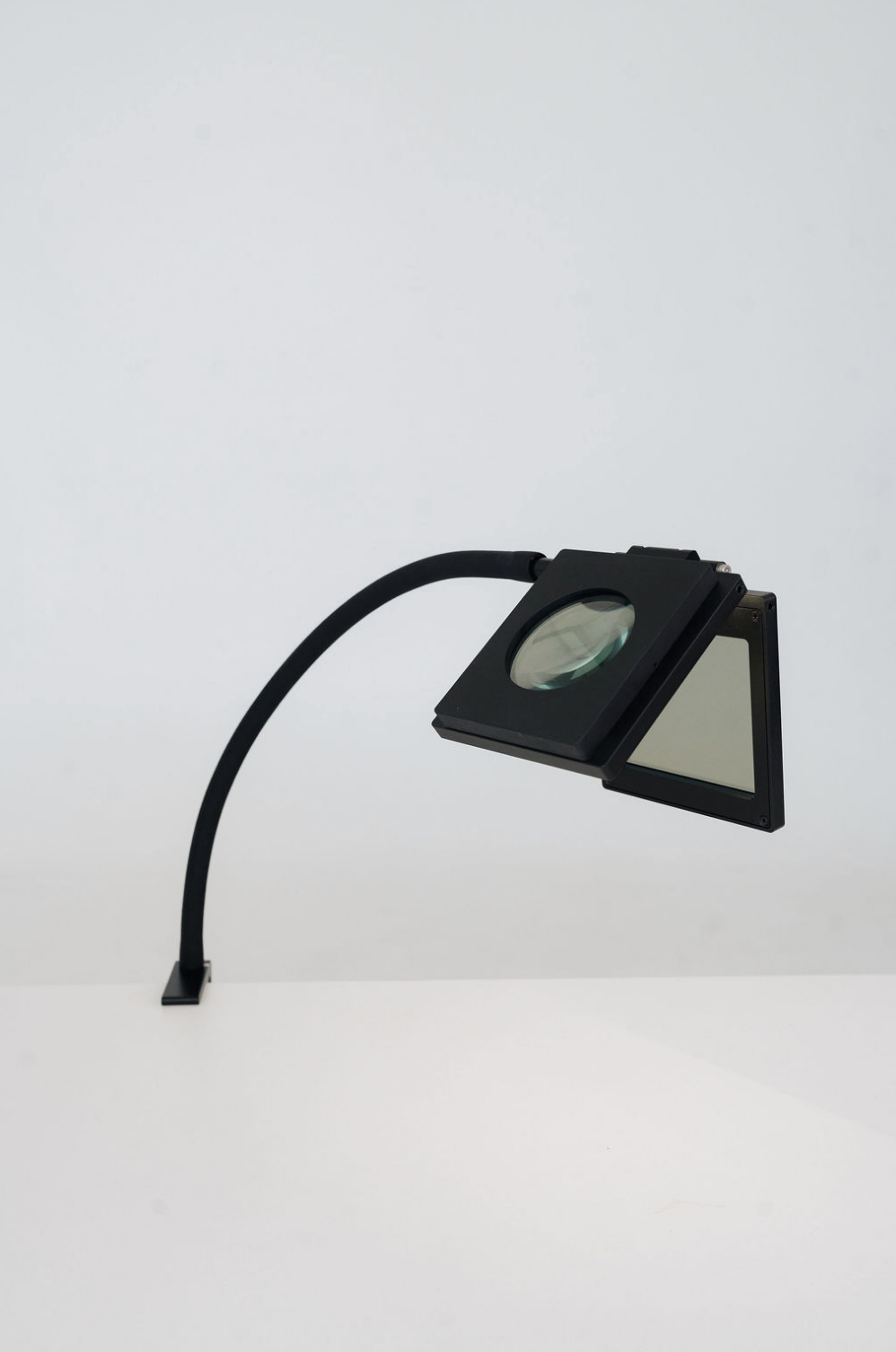 Black desk lamp screenshot, May 12, 2025.