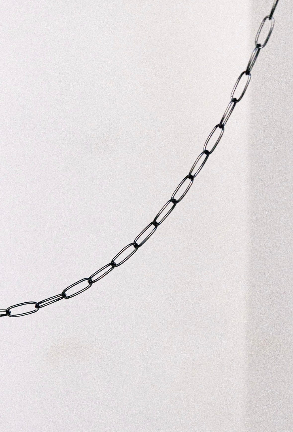 Black chain against white background