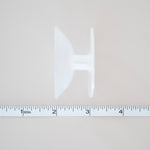 chain roll next to ruler for measurement