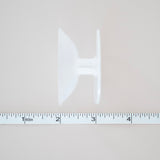 chain roll next to ruler for measurement