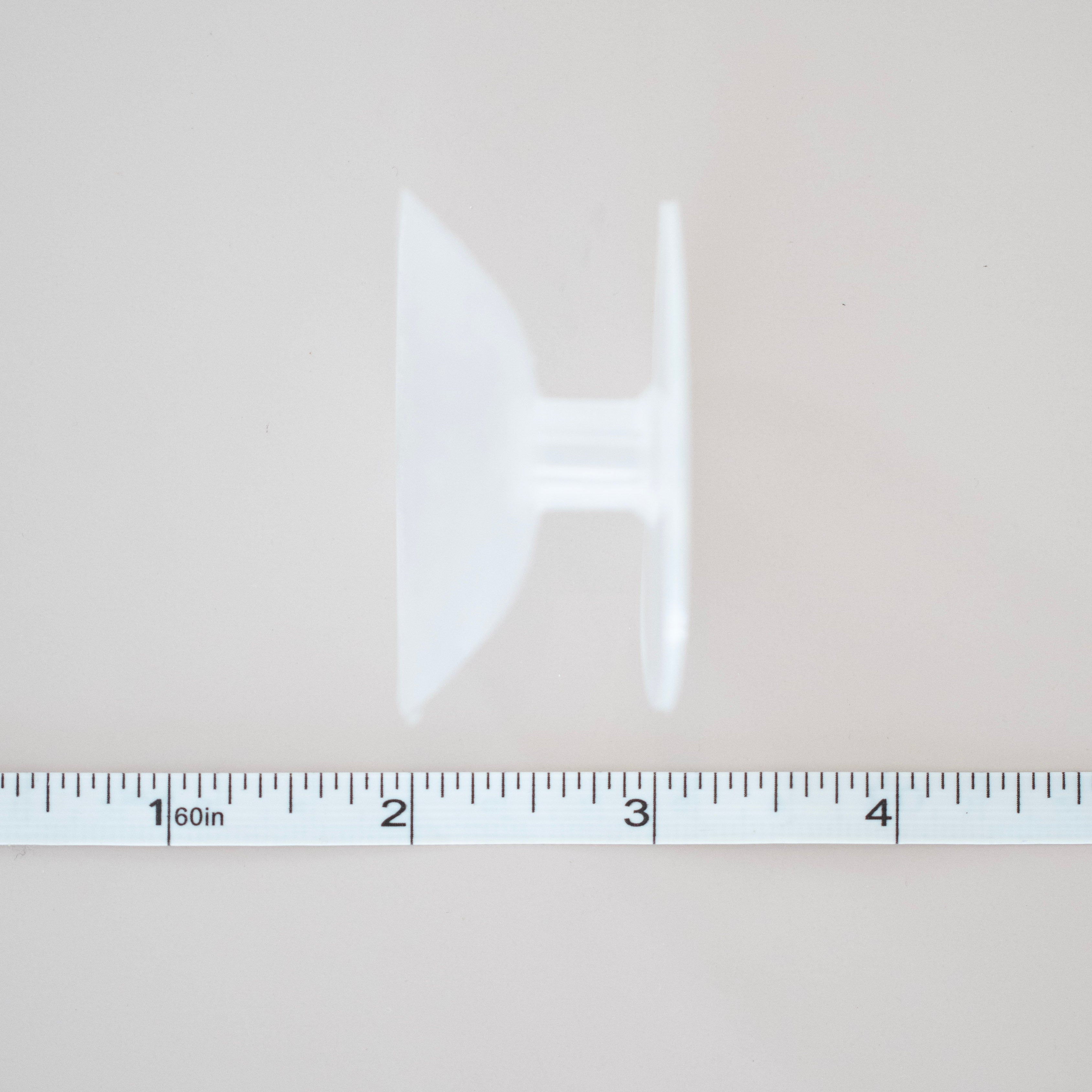 chain roll next to ruler for measurement