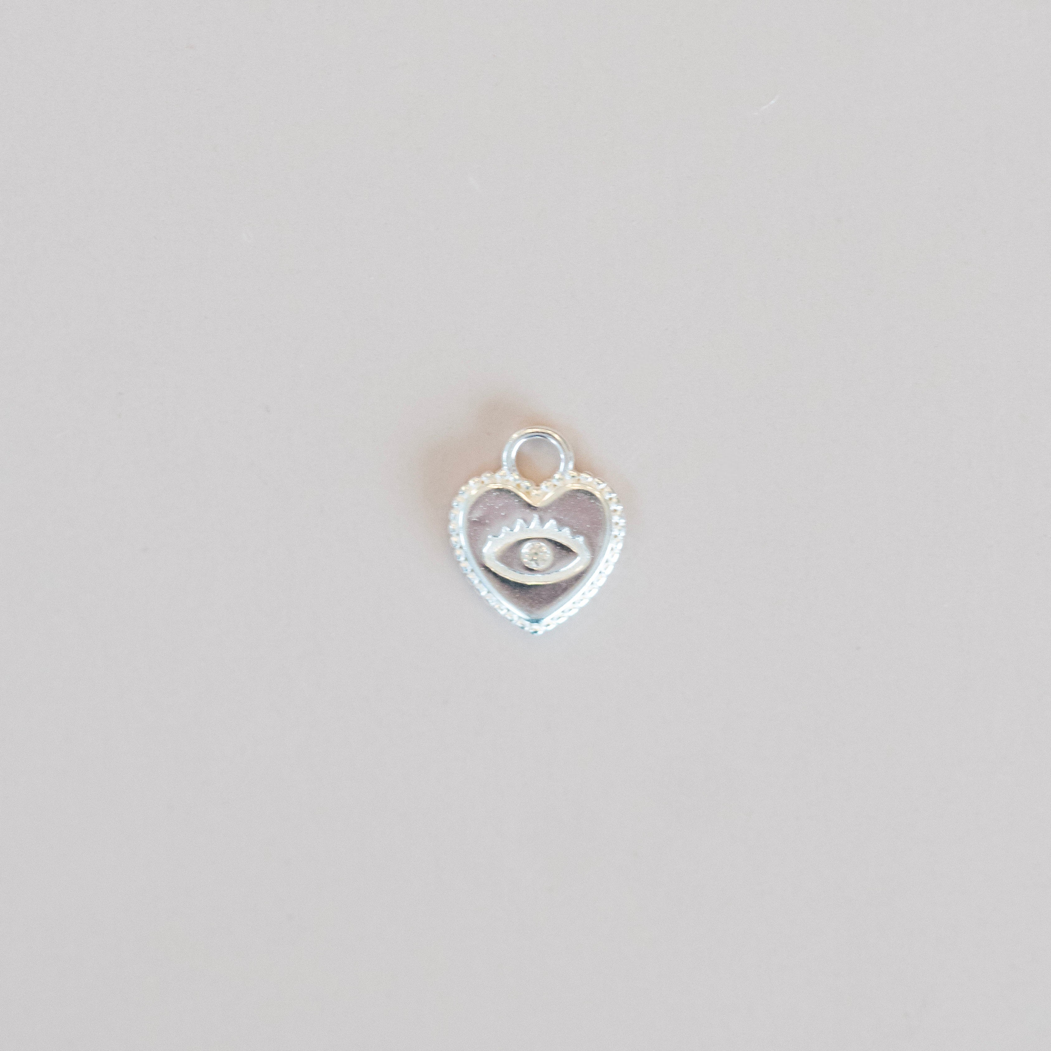 Evil eye heart charm