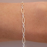 permanent jewelry chain on wrist