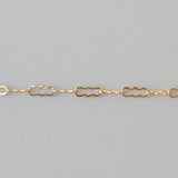 Gold chain on a gray background