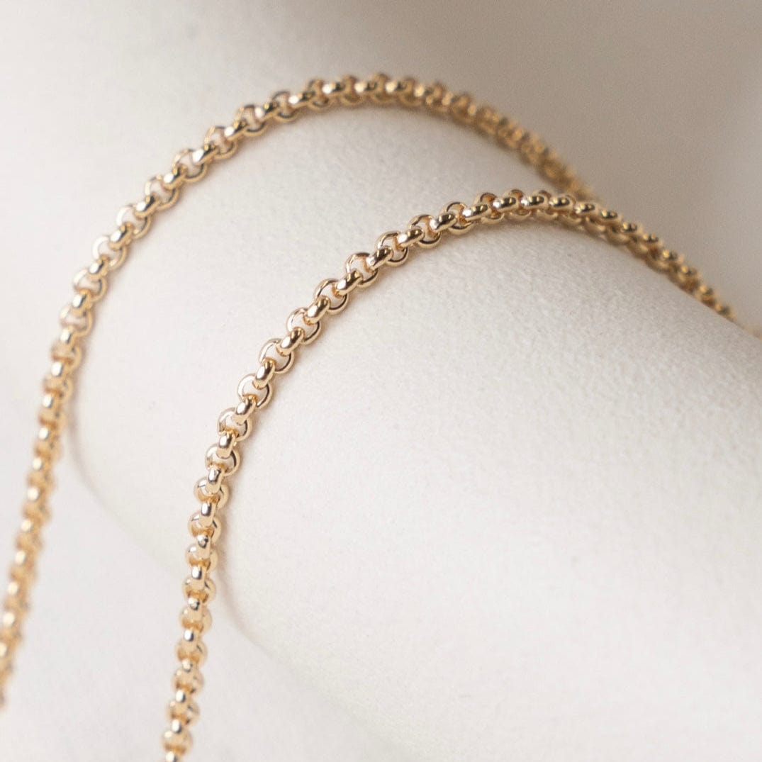 Gold chain necklace detail