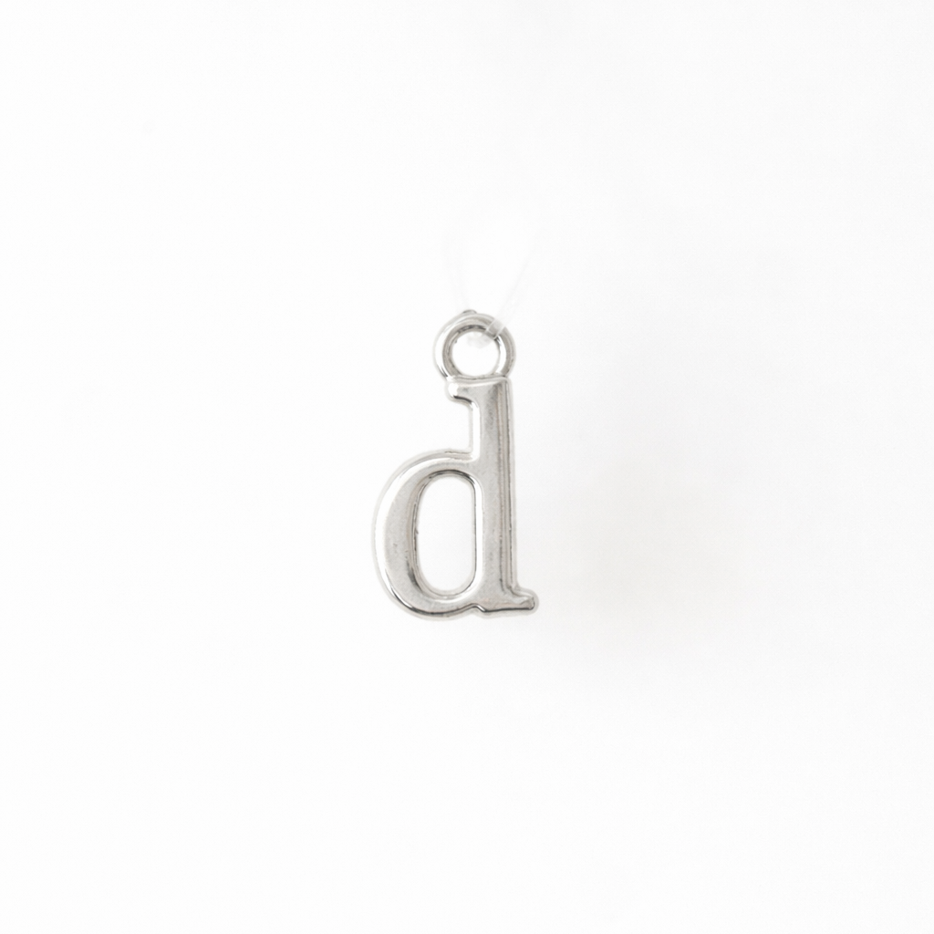 Silver letter 'd' pendant on a white background