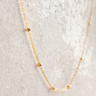 Gold beaded necklace - 772A067A