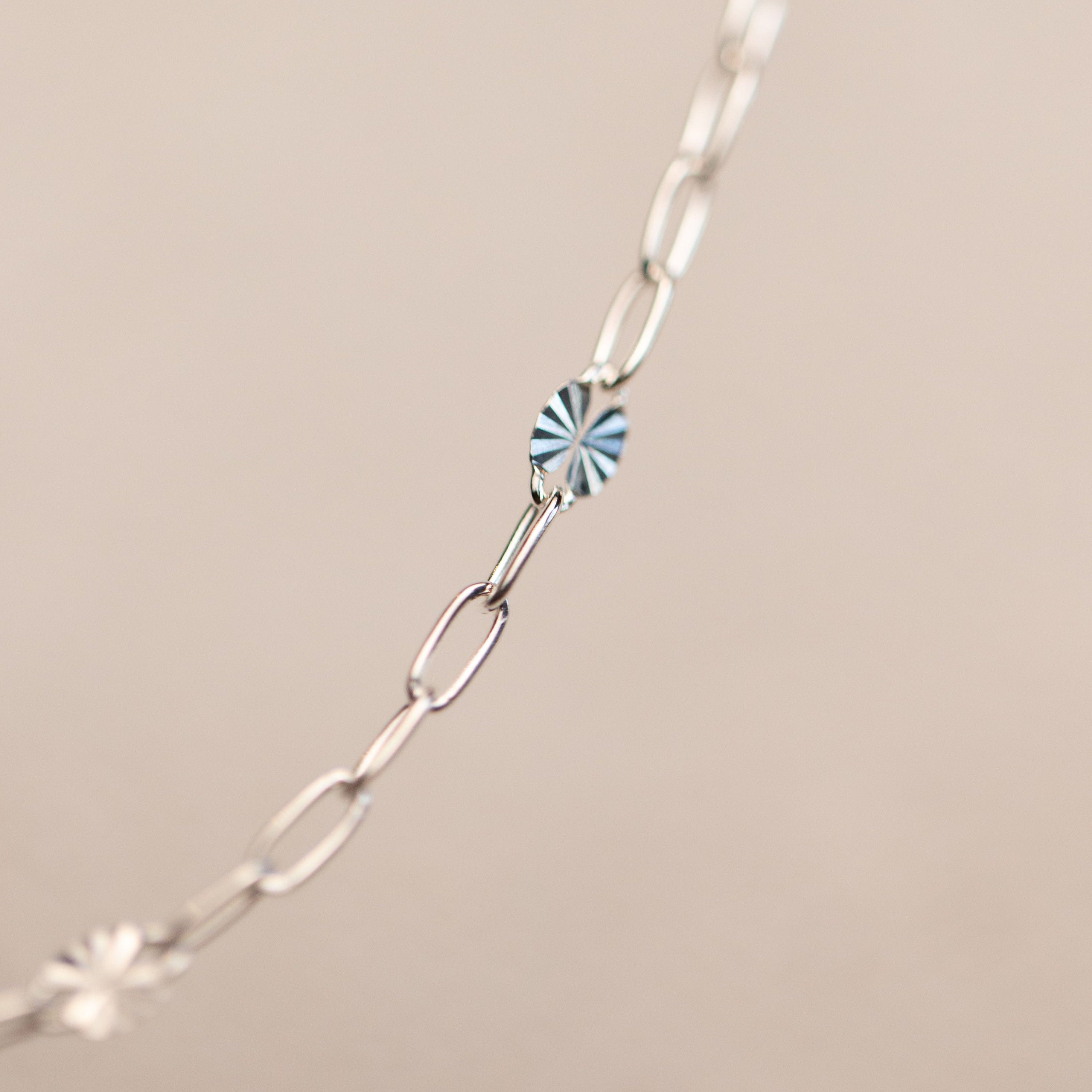 Silver chain necklace with blue crystal detail