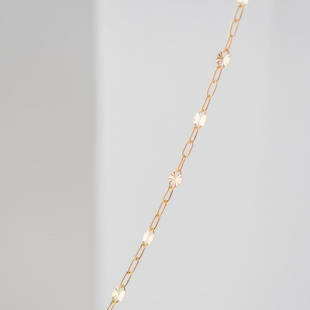 Gold necklace with delicate chain detail