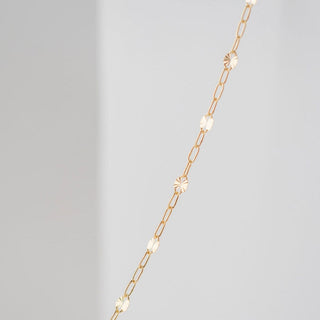 Gold necklace with delicate chain detail