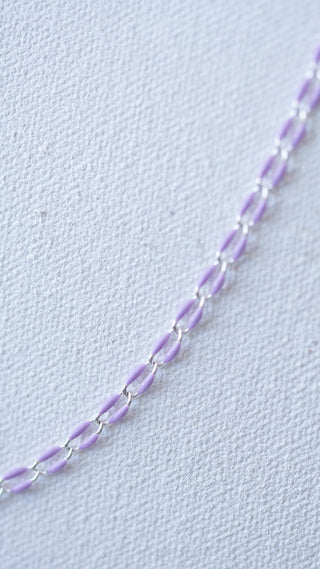 Lavender chain necklace on white background