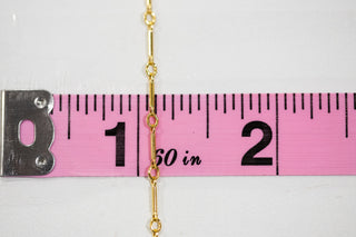 Gold chain measured on a pink ruler, Chain05_-4