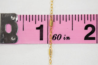 Gold chain 16 long, measured on a ruler.