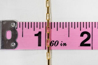 20 Gold Chain Measured on Pink Ruler