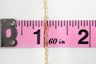 Chain28 - Gold chain near 60 inch ruler