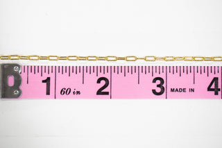 Chain39 gold chain next to ruler showing length