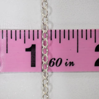 Silver chain measured with ruler