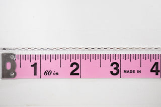 Silver chain measured at 4 inches