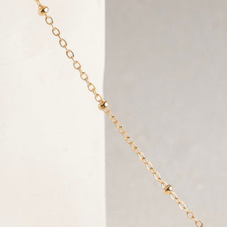 Gold beaded chain necklace D31DE2BF-EA13