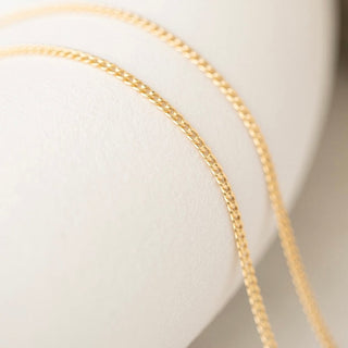 Gold chain necklace detail