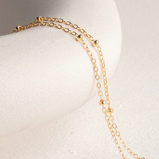 Gold beaded necklace, DCDFB1E9-24A9-4D1B-9432-5C9334061BF9