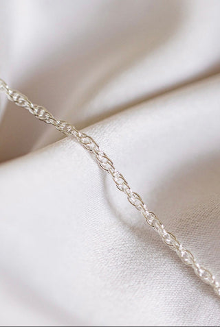Silver chain necklace on satin fabric - DE481CA9