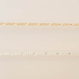 Gold chain on a beige background