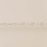 Silver chain on a beige background