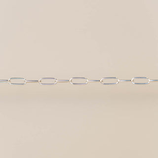 Silver chain on a beige background