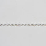 Silver chain on a light gray background