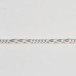 Silver chain on a light gray background