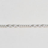 Silver chain on a light gray background