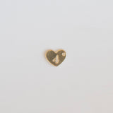 Heart-shaped gold charm with a number '4' on a light gray background