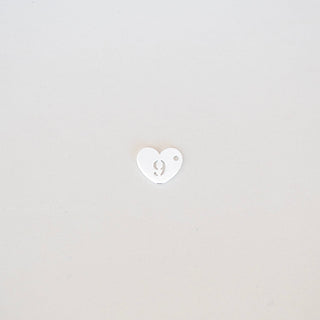 Heart icon with number 9 on a light gray background