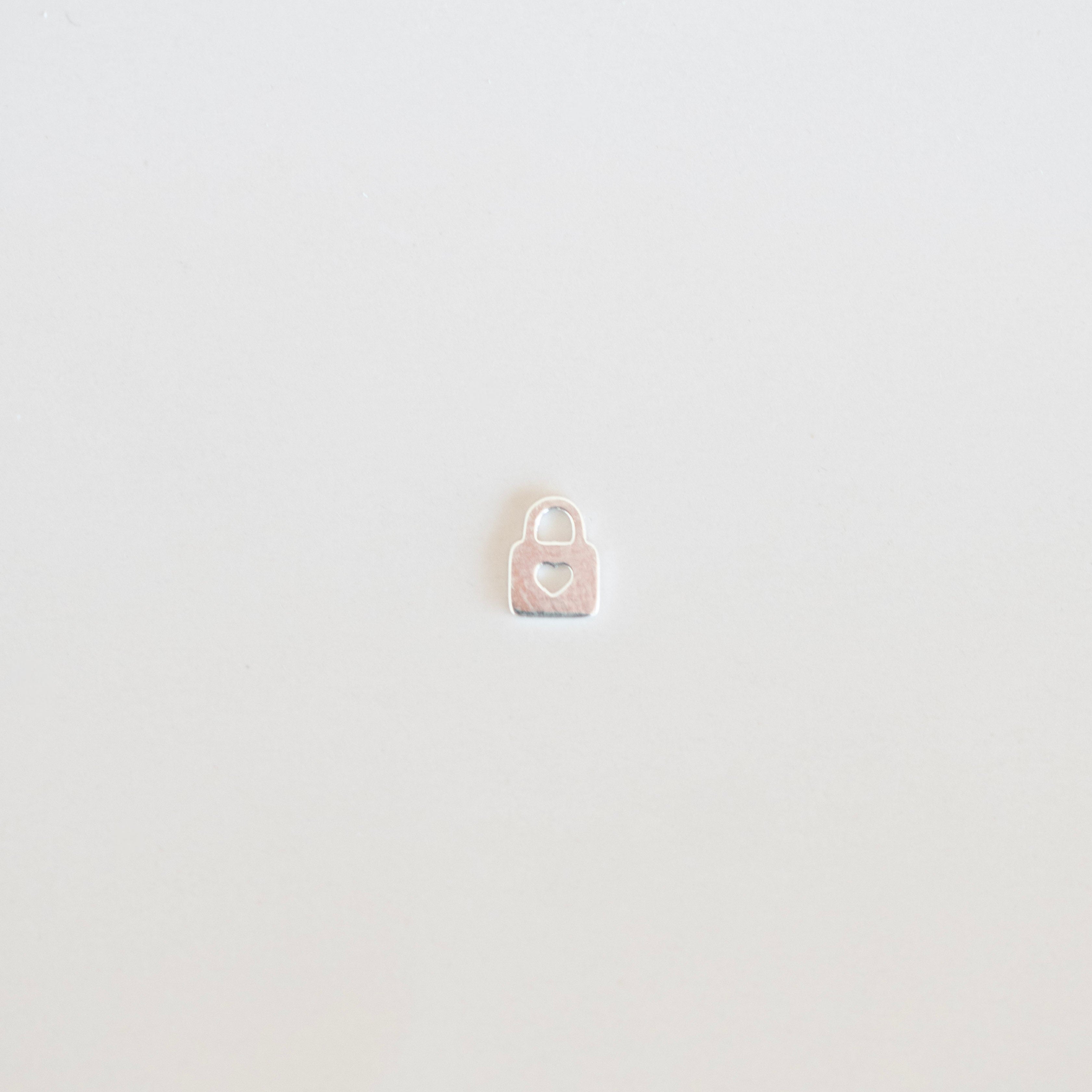 Small padlock on a light gray background