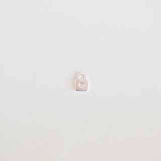 Small padlock on a light gray background
