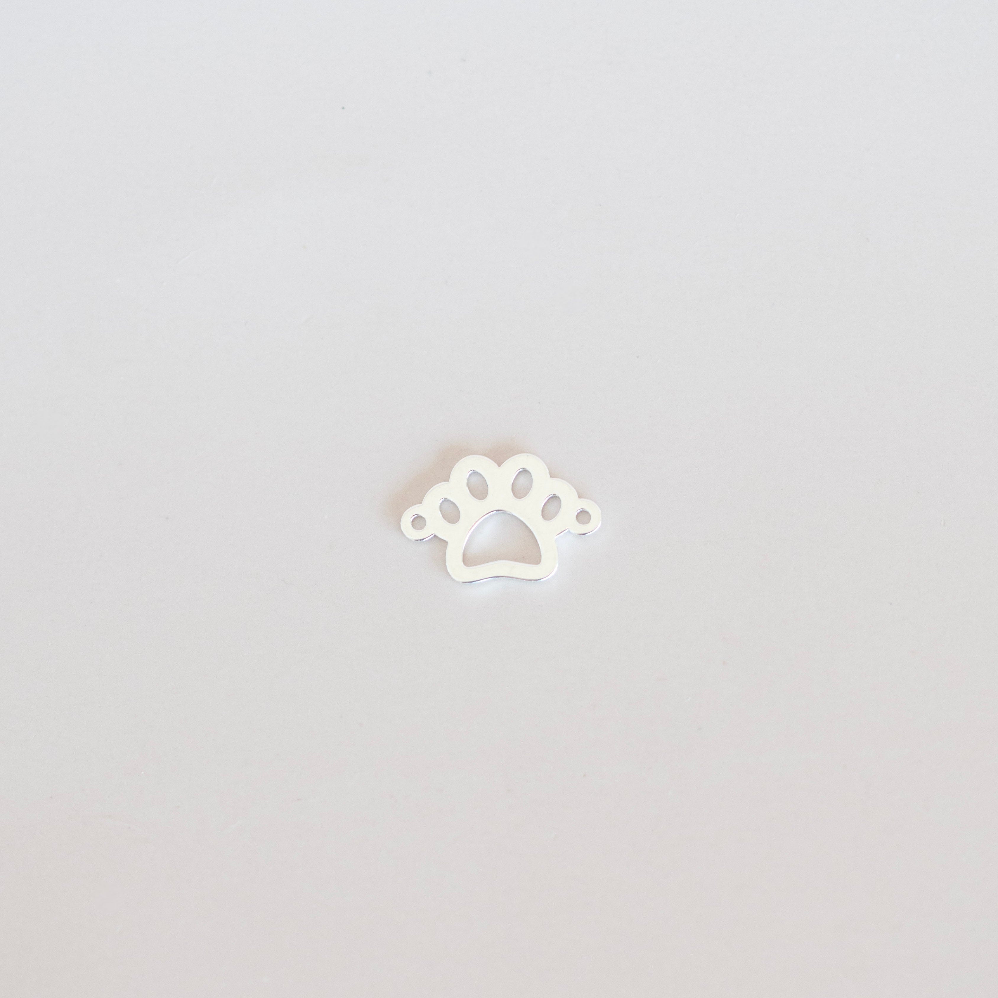 White paw print icon on a light gray background