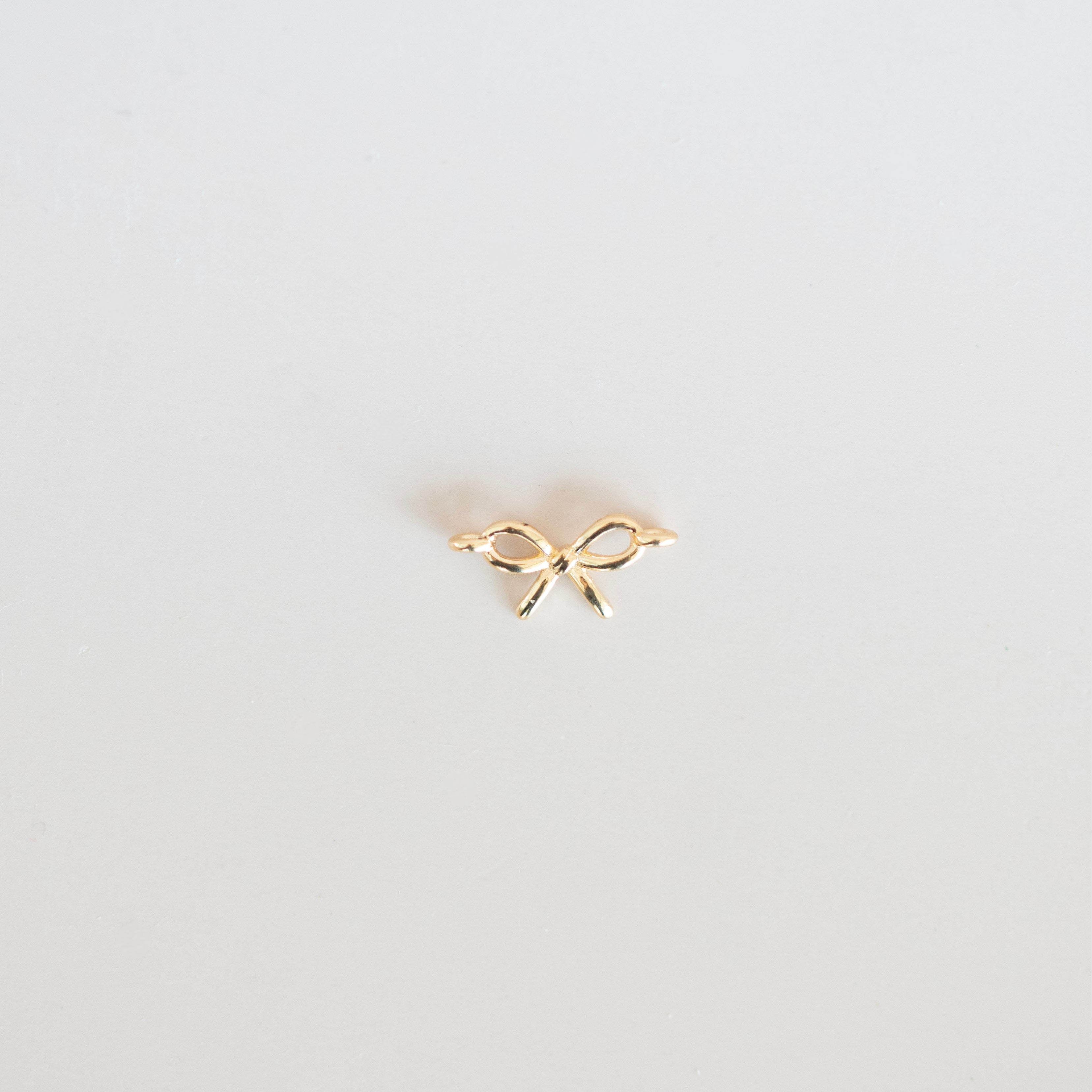 gold bow charm small