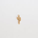 Gold cactus-shaped pendant on a white background