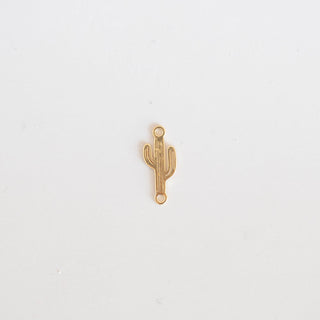 Gold cactus-shaped pendant on a white background