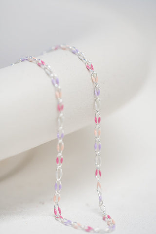 Delicate necklace E3E24D29-0D46-4B54-B009-6CE7464AE0D9, pink and lavender beads.