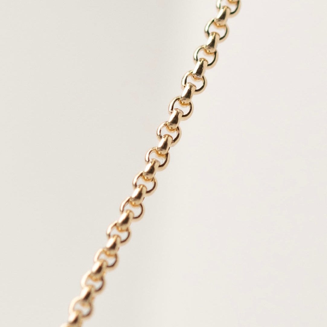 Gold chain necklace detail