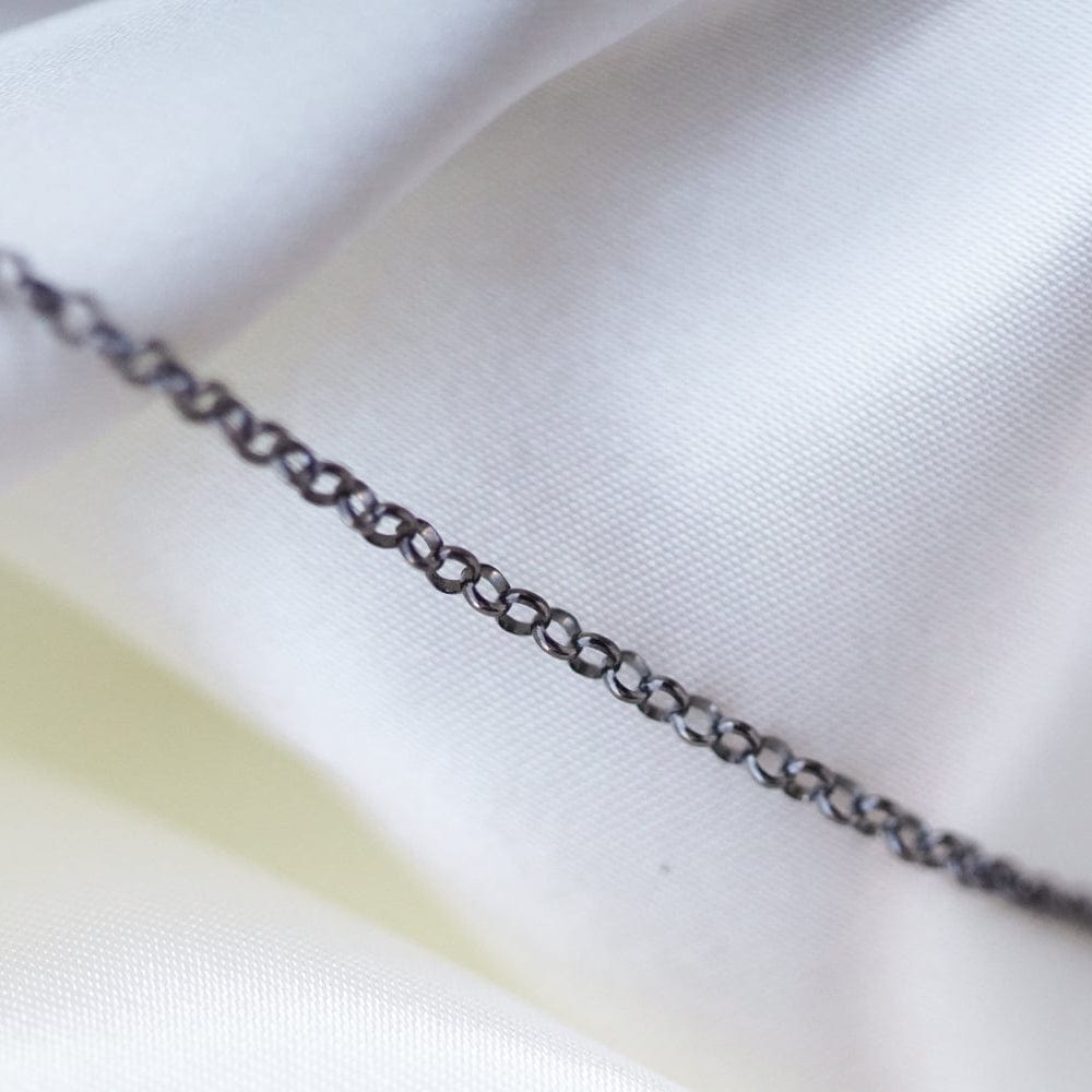 Figaro Flat Mini Chain on White Fabric