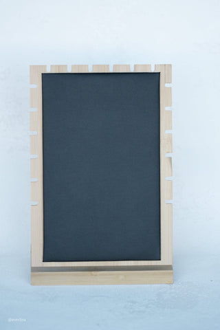 Wooden jewelry display with black insert