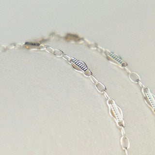 Silver chain necklace detail