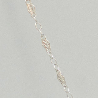 Silver chain necklace detail