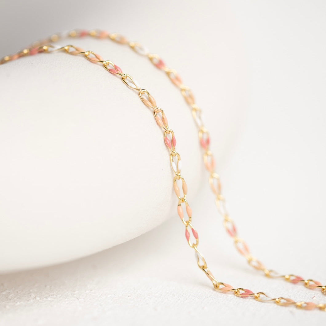 Gold chain necklace on white, FullSizeRender