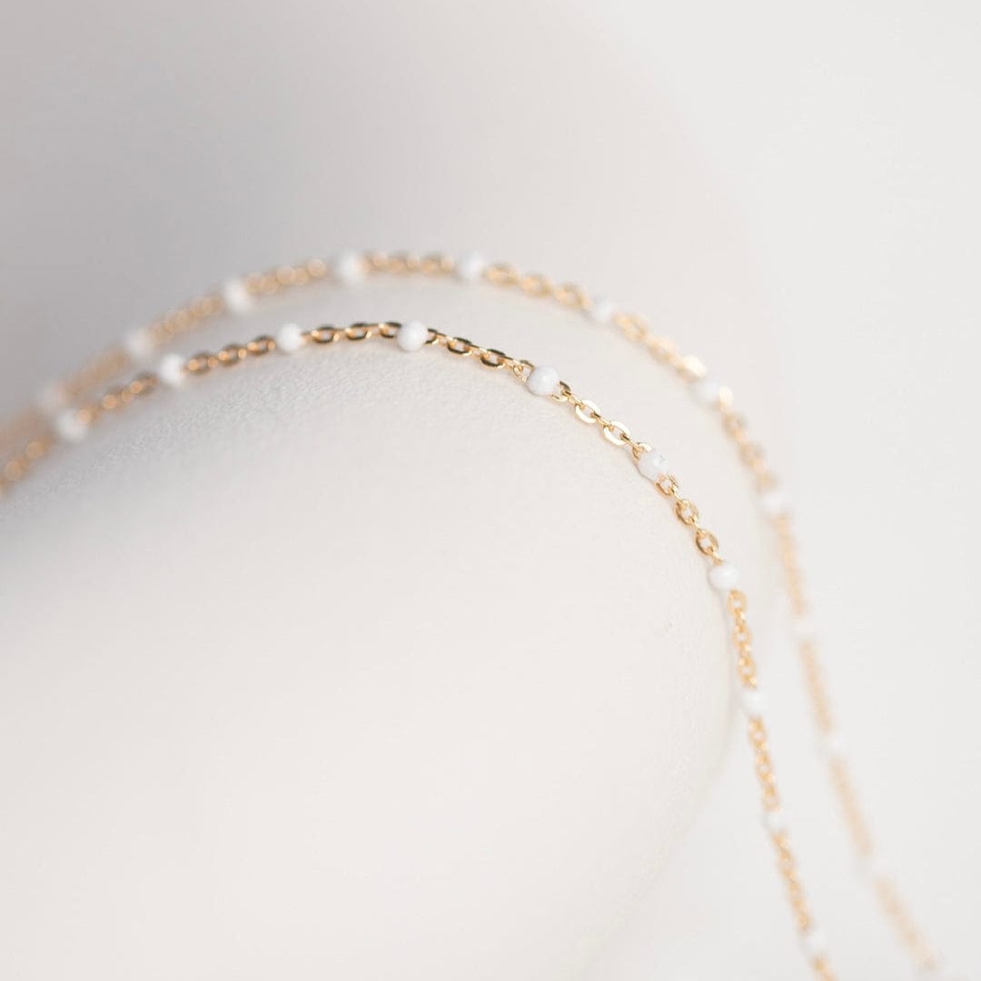 Gold chain necklace detail