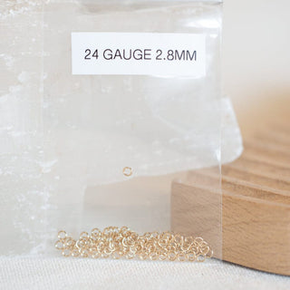 24 gauge 2.8mm jump rings in a bag